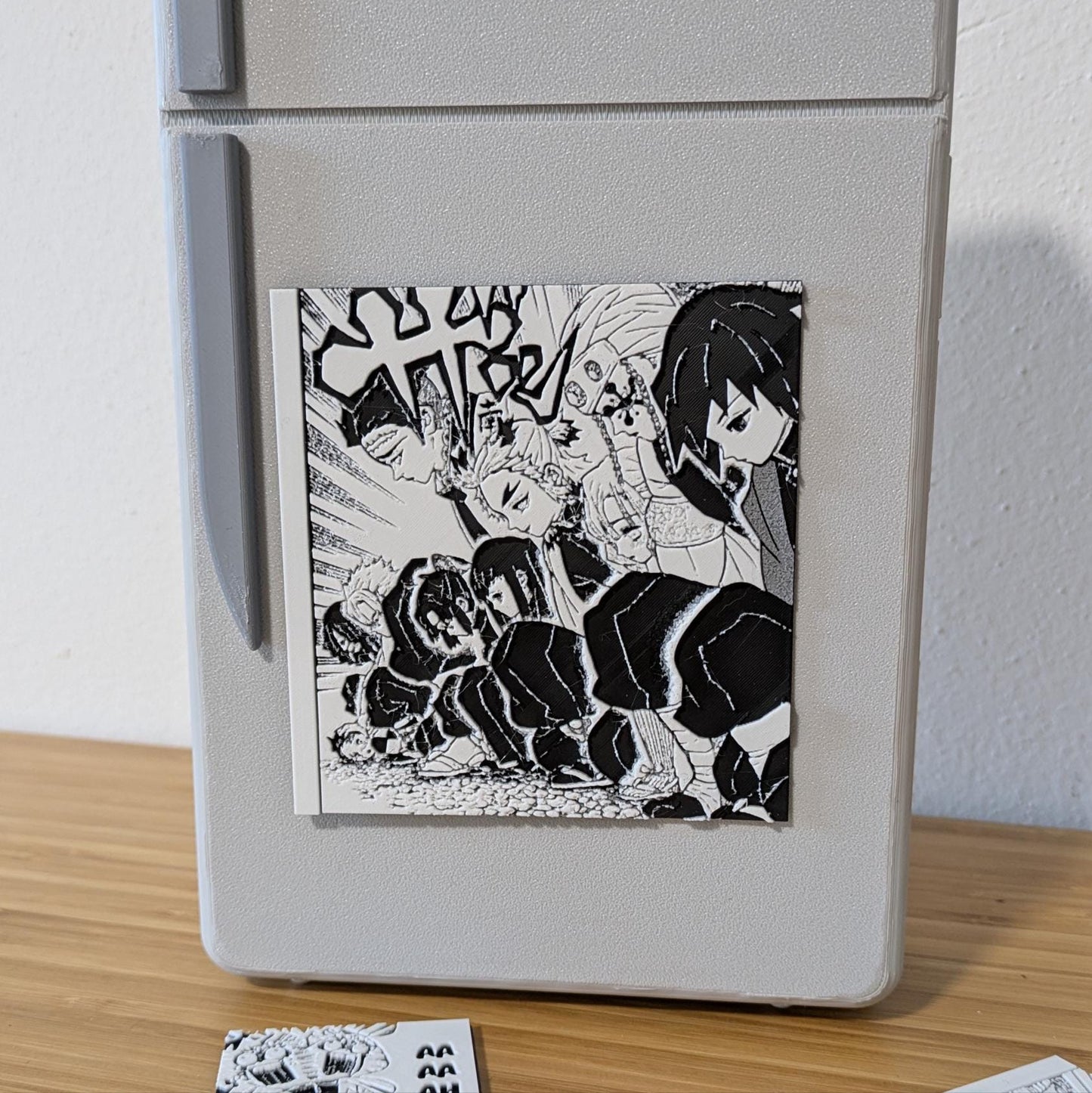 Side angle view of Demon Slayer Hashira double panel magnet displaying 3D depth and premium quality finish
