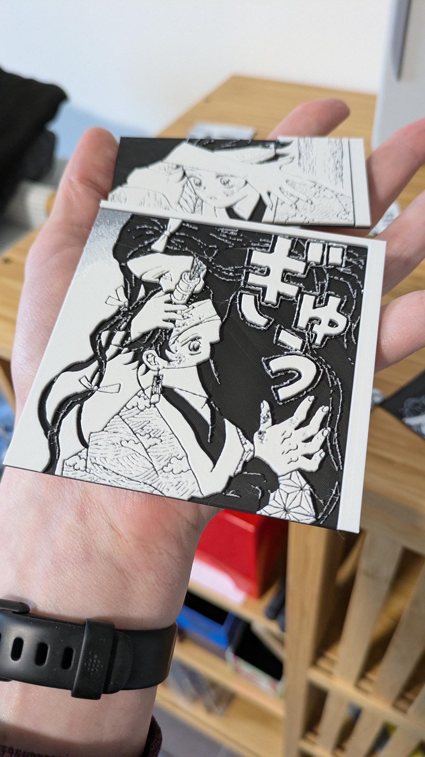 Close-up view of Demon Slayer magnet showing 3D printing texture and details