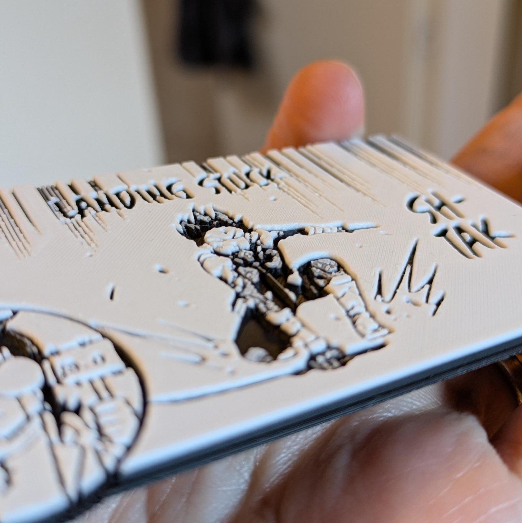 Side view Kikoru landing stuck magnet showing 3D depth and texture