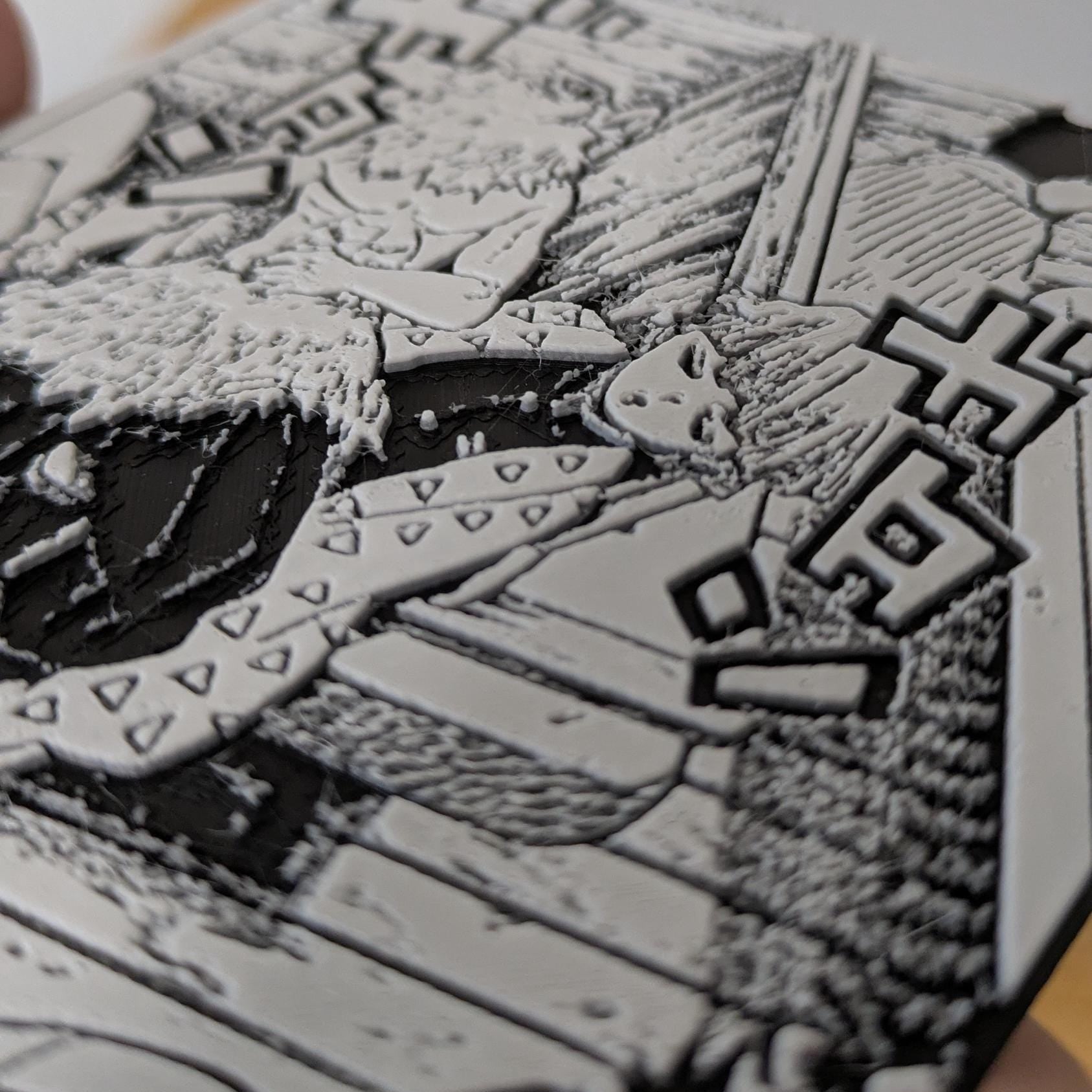 Close-up view of handmade Demon Slayer magnet showing high-definition manga artwork with main characters