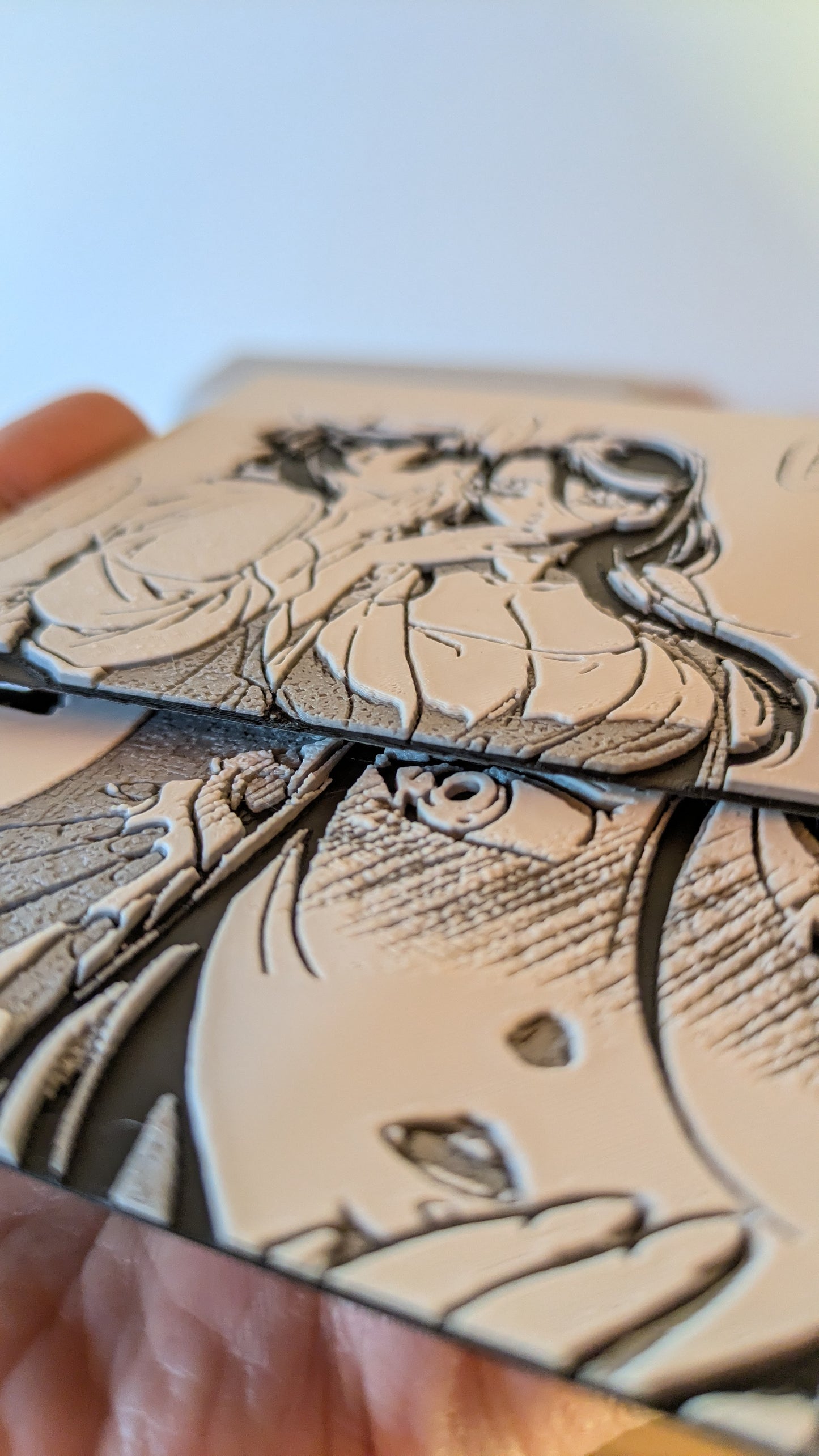 Side angle view of Maomao 3D printed magnet showing dimensional depth and printing quality